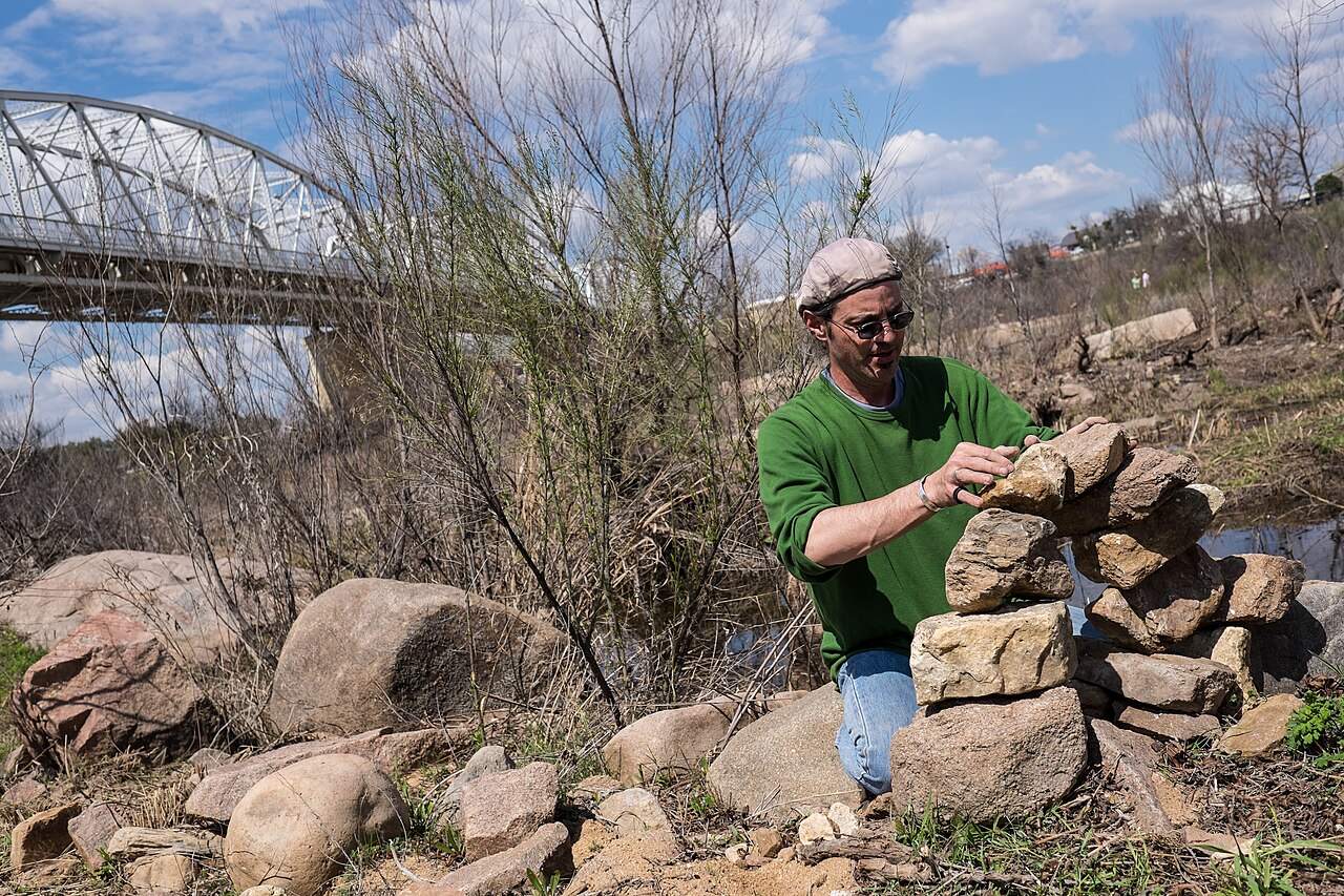 Carefully balanced stones at a rock-stacking championship